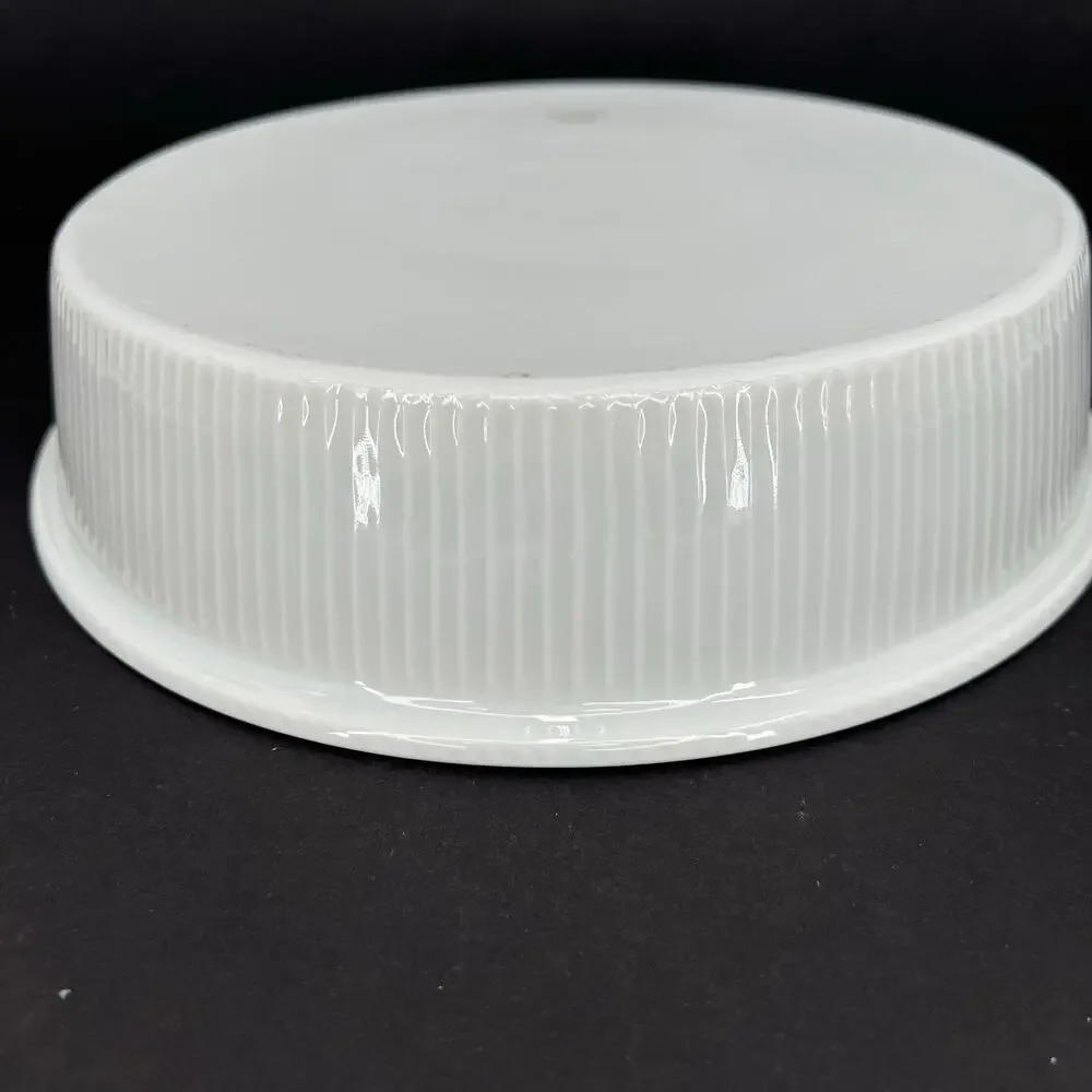 Pillivuyt white ceramic pie quiche baking dish fluted exterior ribbing.